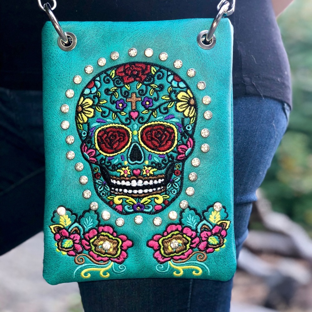Designer handbag teal skull